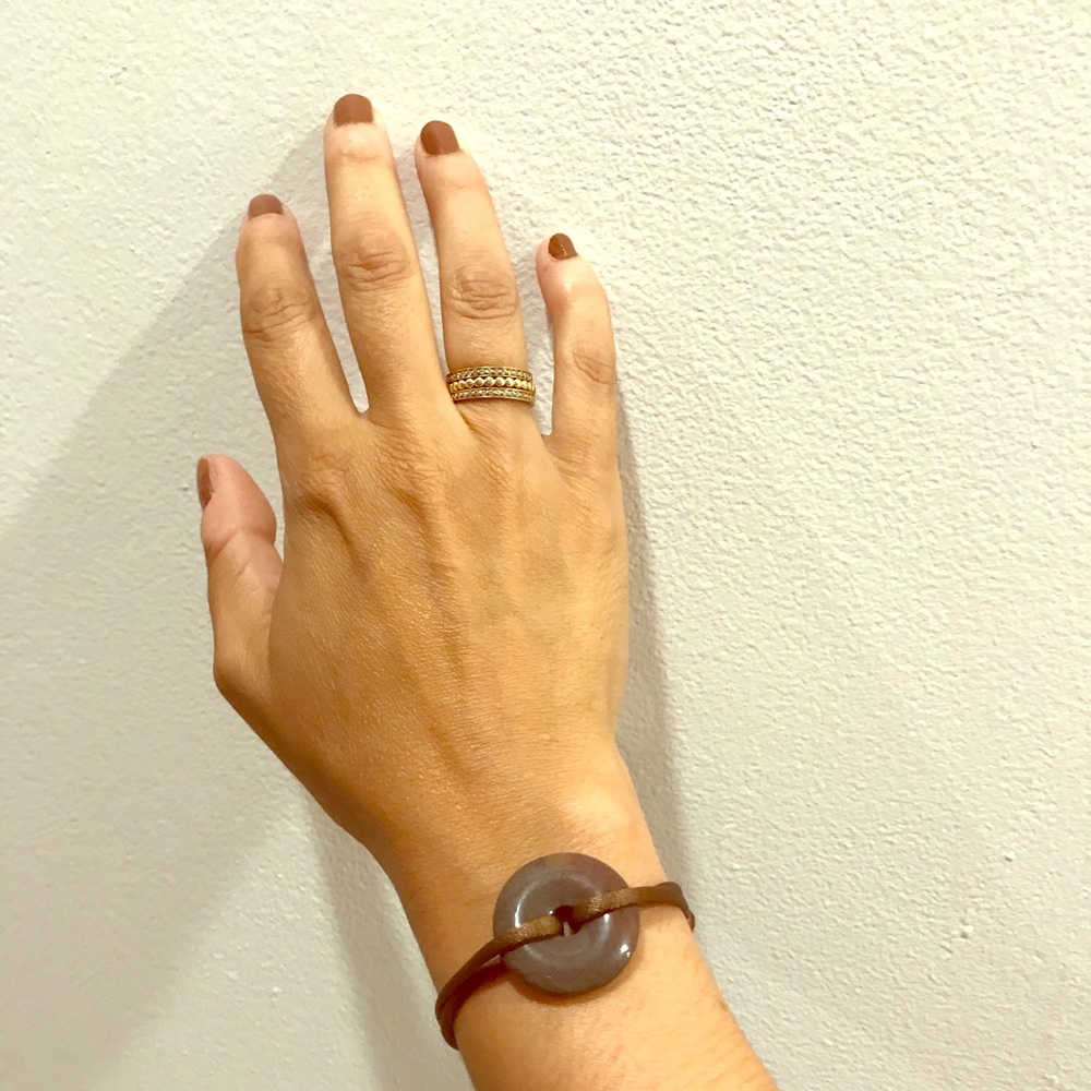 Brown chalcedony and silk pi disc bracelet. NWOT